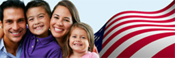 Picture of family with a USA flag